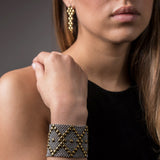 SG Liquid Metal E3 - SS / Gold Titanium (Stainless Steel Earring) by Sergio Gutierrez