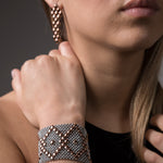 SG Liquid Metal E3 - SS / Rose Titanium (Stainless Steel Earring) by Sergio Gutierrez