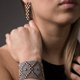 SG Liquid Metal E3 - SS / Rose Titanium (Stainless Steel Earring) by Sergio Gutierrez