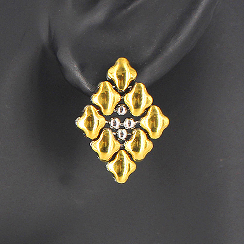 SG Liquid Metal E11 - SS / Gold Titanium (Stainless Steel Earring) by Sergio Gutierrez