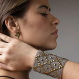 SG Liquid Metal E11 - SS / Gold Titanium (Stainless Steel Earring) by Sergio Gutierrez